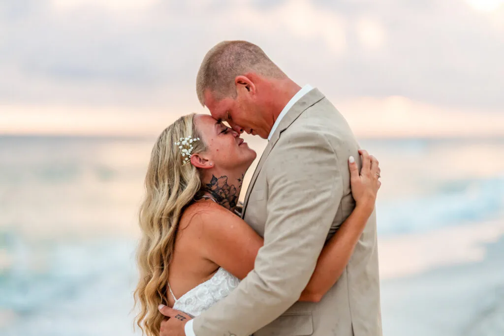 Chance and Sam on the beach in Destin after their wedding, photographed by KDH Weddings