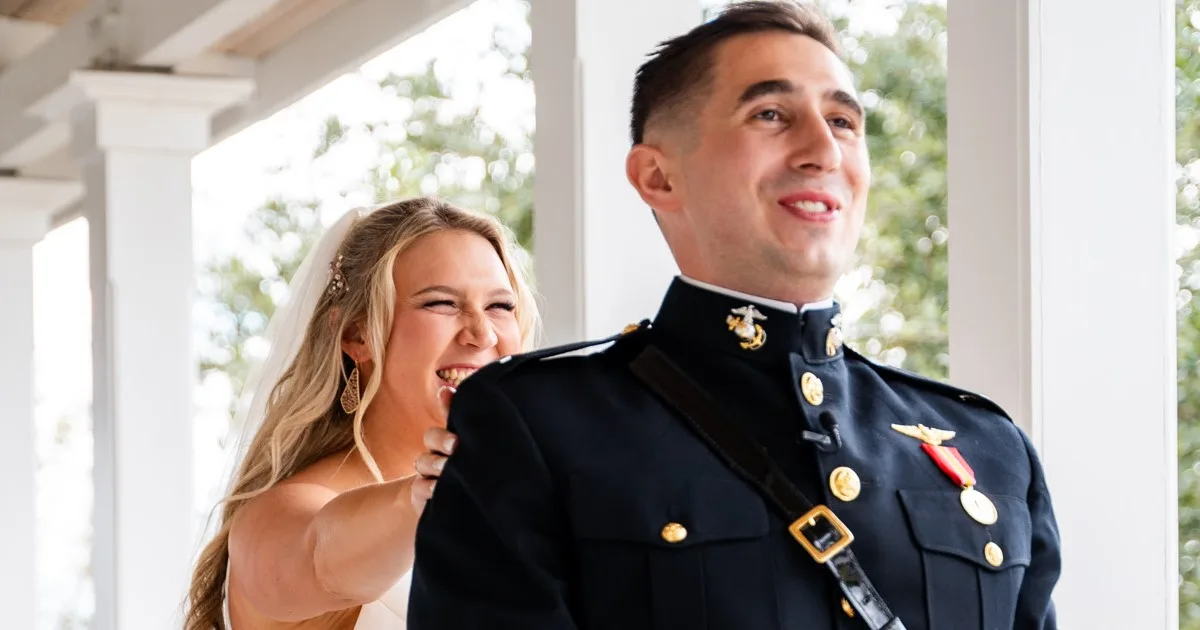 Kaisey laughing beside Bobby in his Marine Corps dress blues on a white columned porch at their Pensacola wedding
