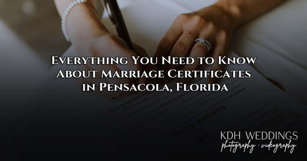 Bride and groom at Pensacola beach wedding ceremony signing their marriage license before receiving their official certificate