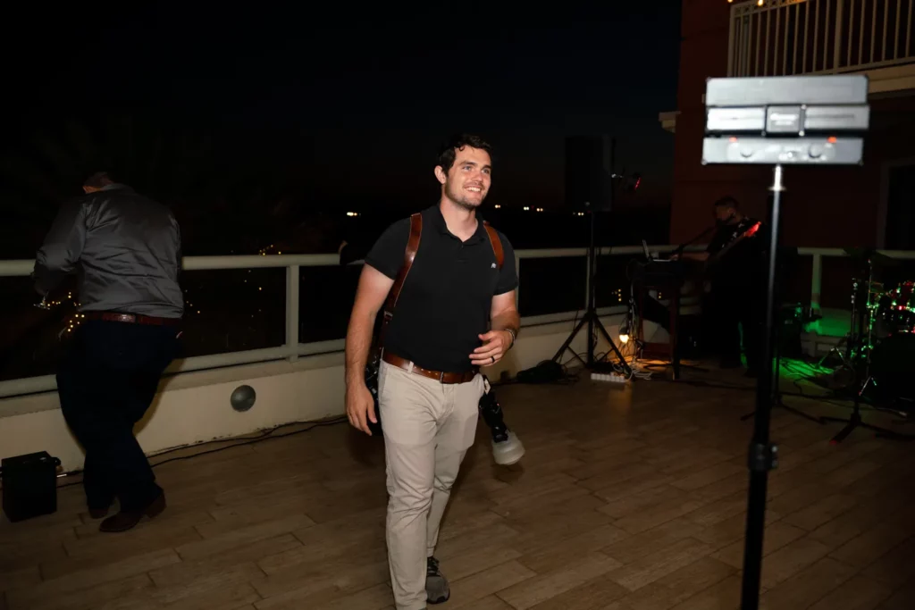 Korbin Henderson - owner: kdh weddings BTS of himself at a wedding taking photographs