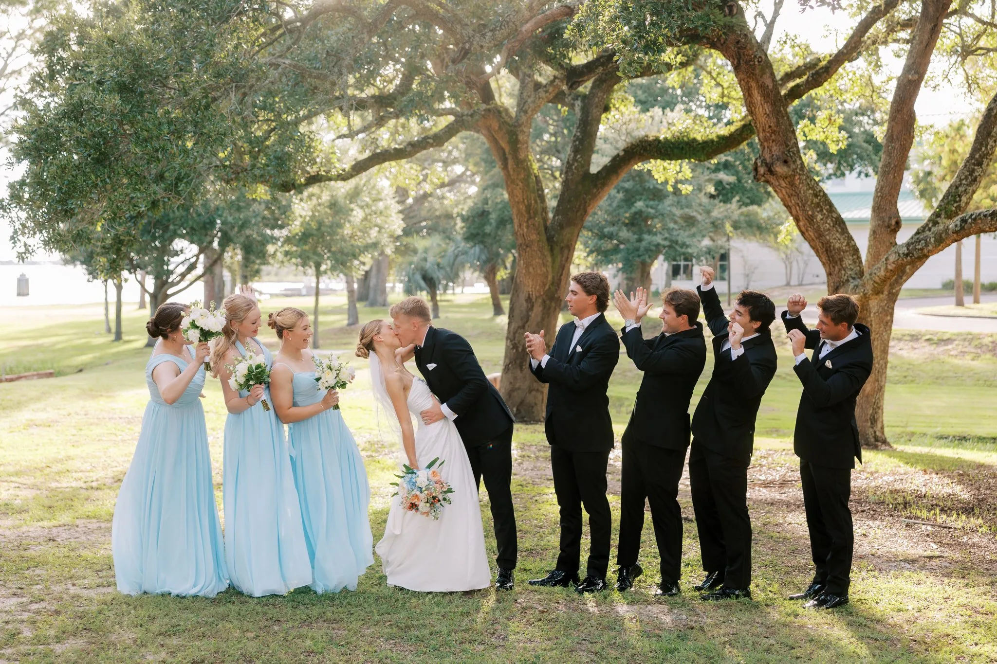 Pensacola Wedding Photographer - KDH Weddings 10 Wedding party under the live oaks on Hurlburt Field, bridesmaids in powder blue and groomsmen in black tuxedos