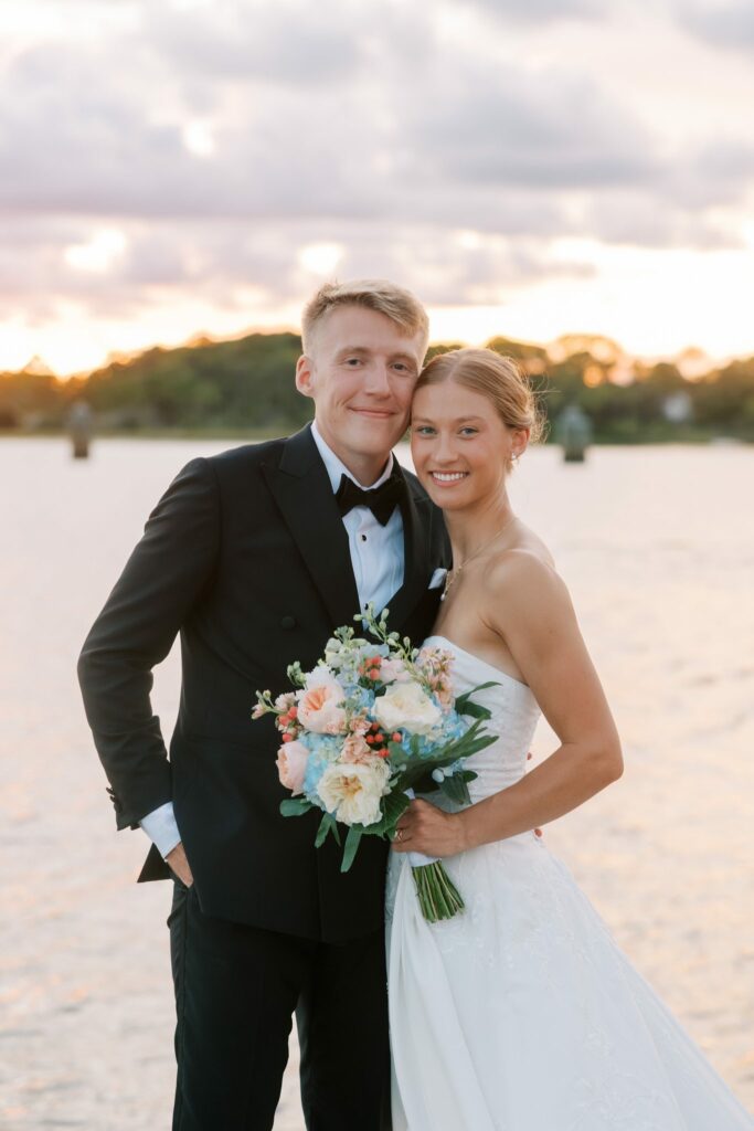 Jake & Lauren's Hurlburt Field Wedding on Santa Rosa Sound 11 Jake and Lauren smiling by the water at sunset on Hurlburt Field