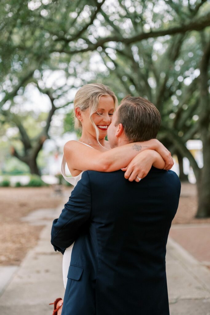 Close embrace under the oaks in downtown Pensacola