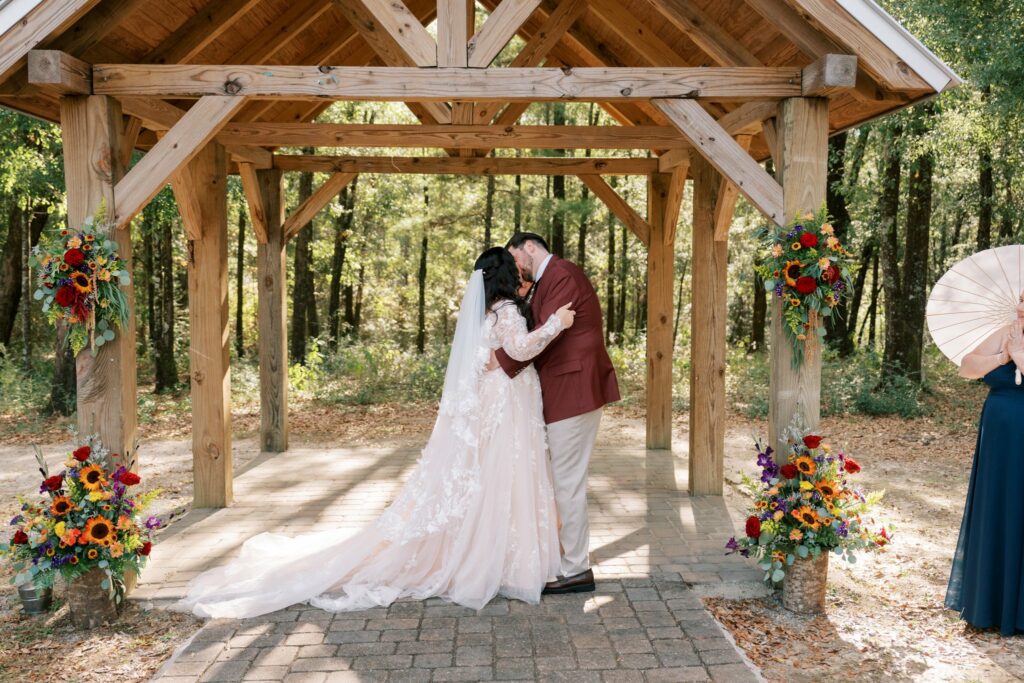 Jacob & Angelina's Holland Farms Wedding 5 Jacob and Angelina at the timber pavilion on the brick aisle at Holland Farms in Milton, FL
