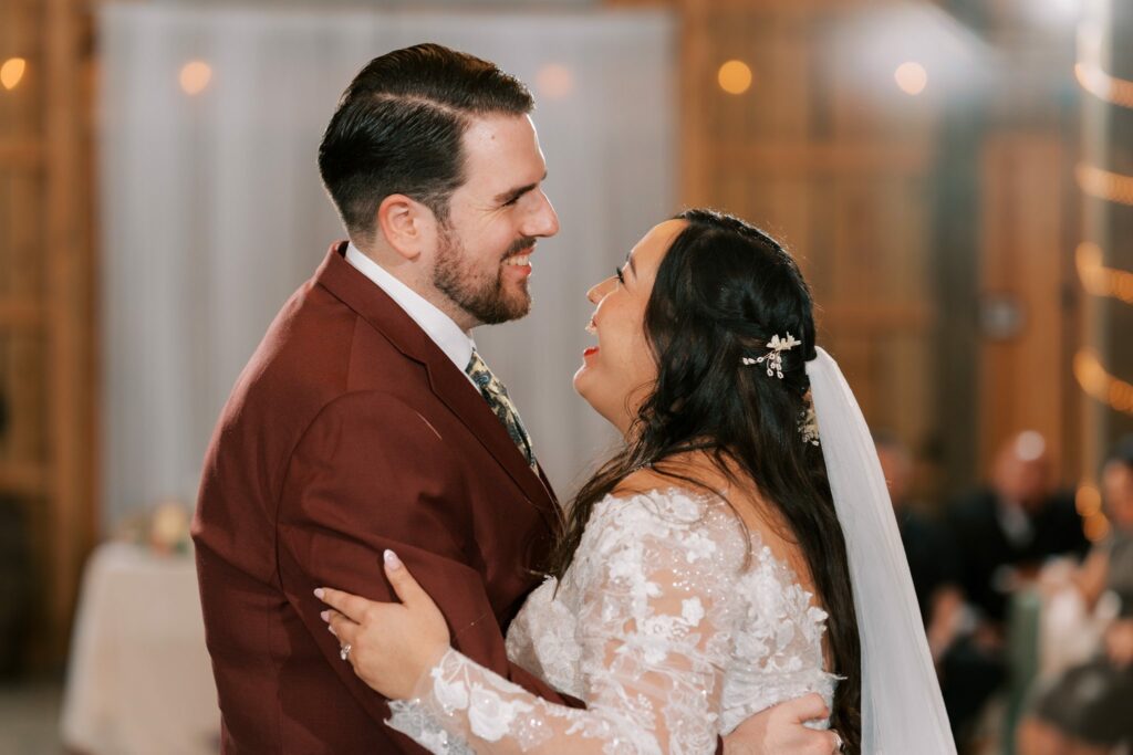 Jacob & Angelina's Holland Farms Wedding 13 Jacob and Angelina sharing a close first dance in the barn reception at Holland Farms