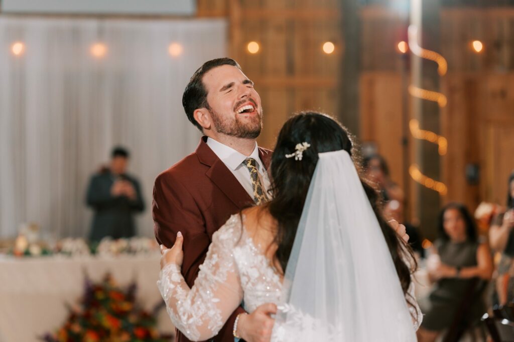 Jacob & Angelina's Holland Farms Wedding 14 Jacob laughing during his first dance with Angelina at their Holland Farms wedding reception