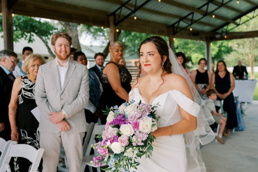 Brandon & Victoria's Laurel Hill Farm Wedding 4 Victoria walks down the aisle under the covered pavilion at Laurel Hill Farm