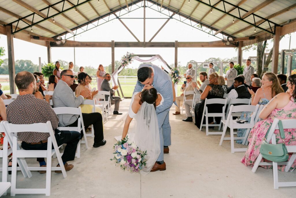 Brandon & Victoria's Laurel Hill Farm Wedding 5 Brandon and Victoria kiss at the end of their pavilion ceremony at Laurel Hill Farm