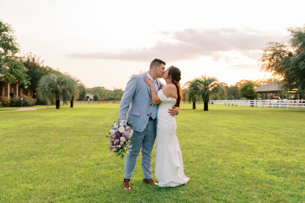 Brandon & Victoria's Laurel Hill Farm Wedding 13 Brandon and Victoria kiss in the open pasture at sunset at Laurel Hill Farm