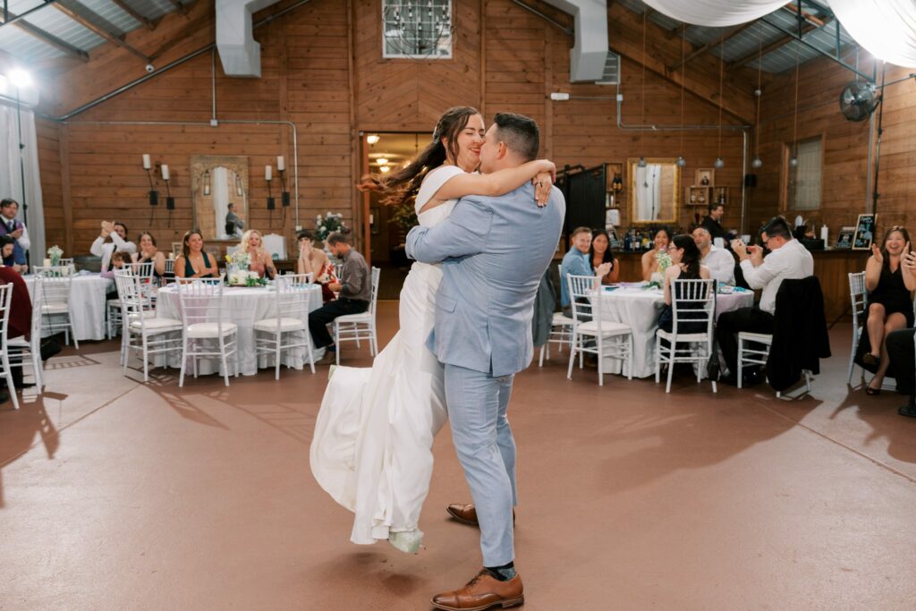 Brandon & Victoria's Laurel Hill Farm Wedding 15 Brandon lifts Victoria during their first dance at Laurel Hill Farm