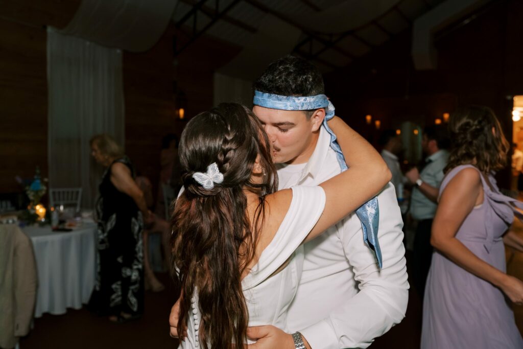 Brandon & Victoria's Laurel Hill Farm Wedding 18 Victoria kisses Brandon on the dance floor at Laurel Hill Farm