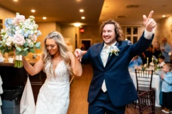 Beautiful Pensacola Wedding at 5eleven Palafox 30 bride and groom - man and woman holding hands and dancing after getting married at at 5eleven Palafox in pensacola fl
