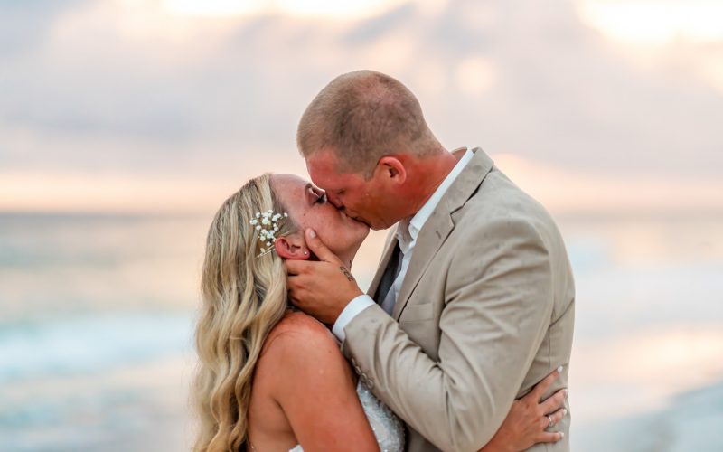 chance & sam bride and groom kissing on beach wedding photography destin fl kdh weddings